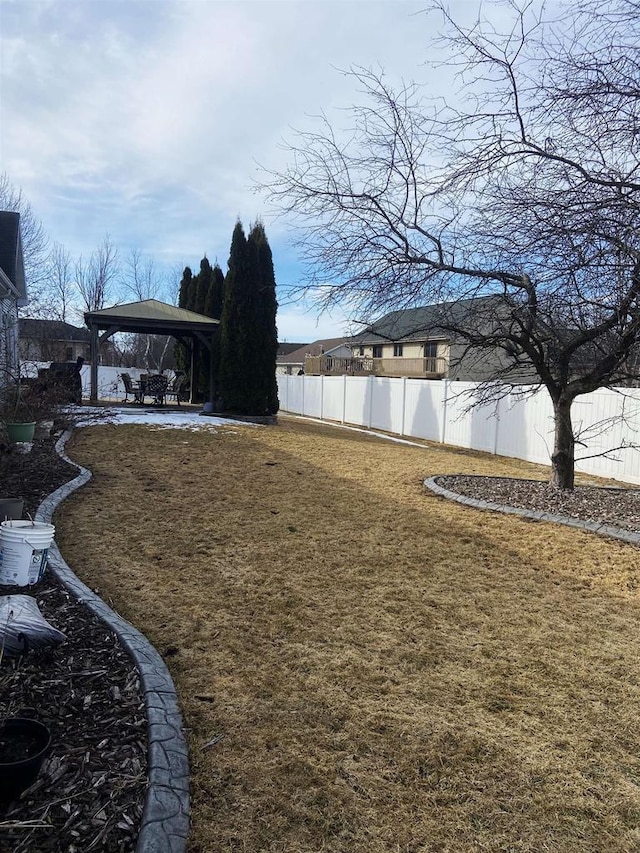 view of yard with a gazebo, a patio area, and a fenced backyard