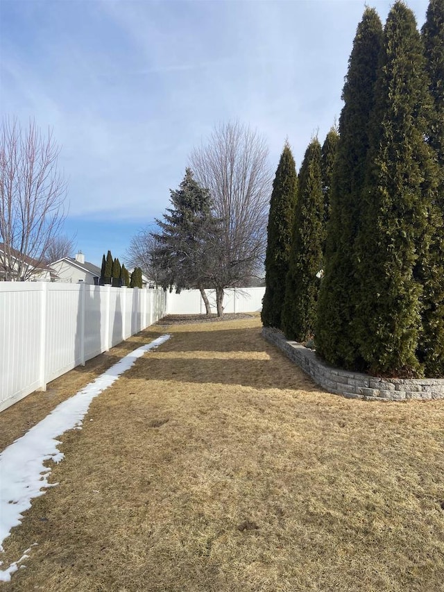 view of yard featuring a fenced backyard