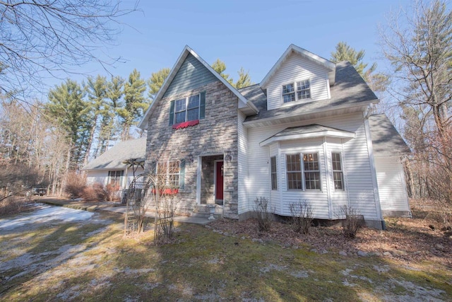 view of front facade featuring stone siding