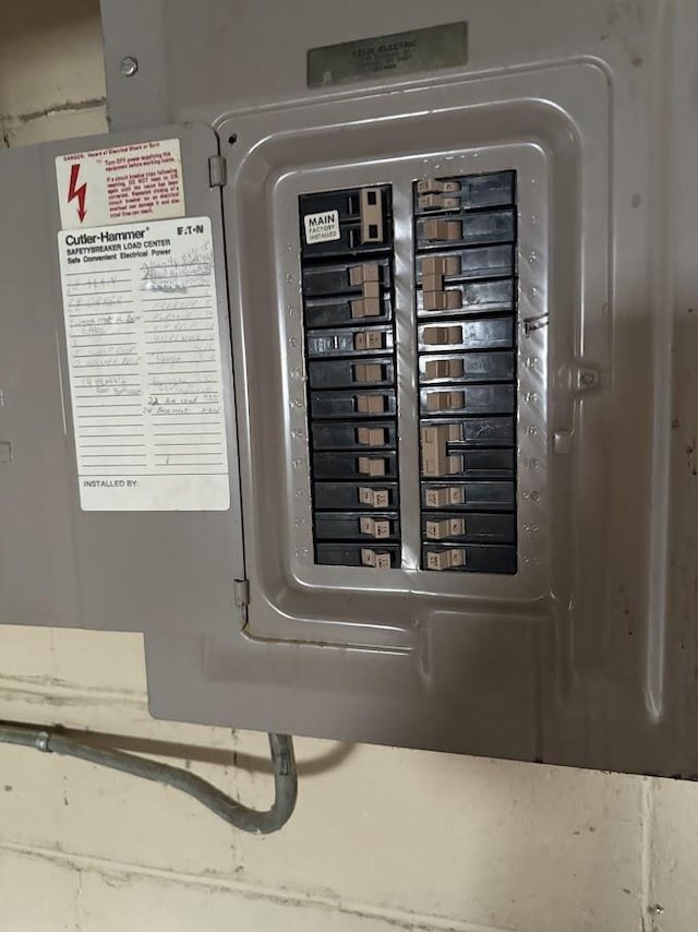 utility room featuring electric panel