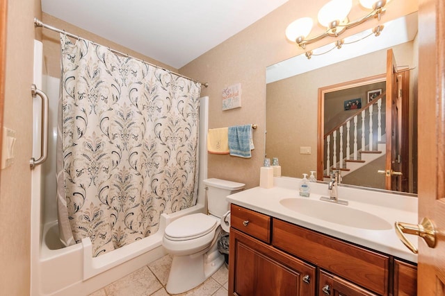 full bathroom featuring vanity, tile patterned flooring, shower / bath combo with shower curtain, toilet, and a chandelier