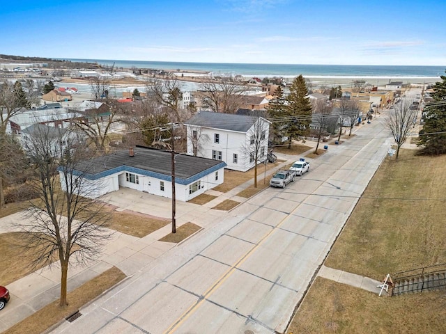 bird's eye view with a view of the beach and a water view