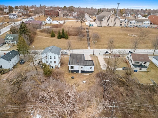 birds eye view of property with a residential view