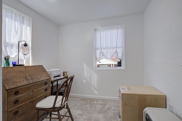 carpeted office space featuring baseboards