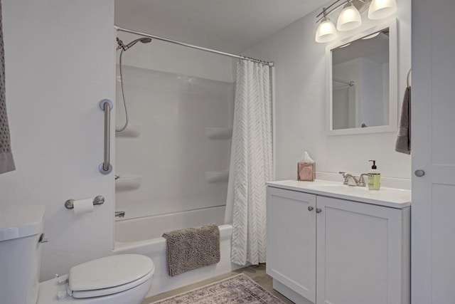 bathroom featuring vanity, toilet, and shower / bathtub combination with curtain