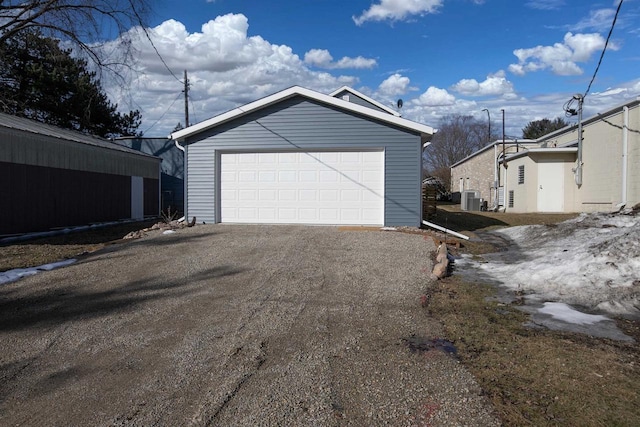 detached garage featuring central air condition unit