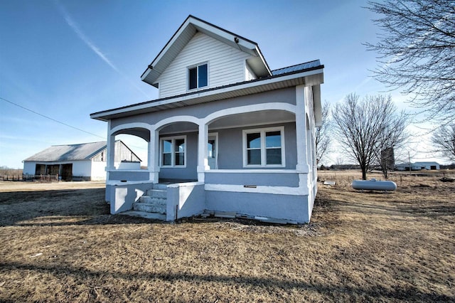 view of front of home with covered porch