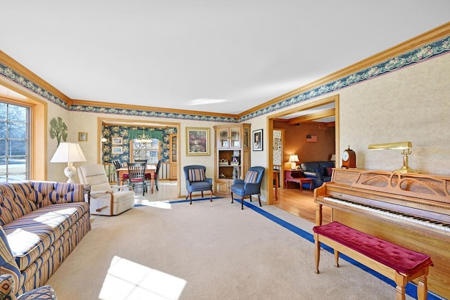 carpeted living room featuring ornamental molding