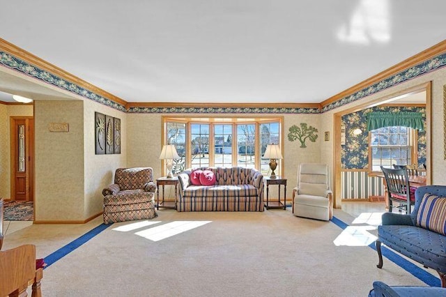 carpeted living room featuring wallpapered walls, baseboards, and ornamental molding