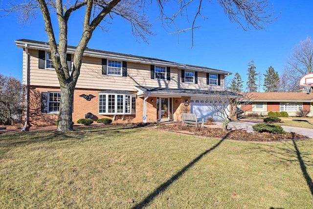 view of front of house with a garage, brick siding, concrete driveway, and a front yard