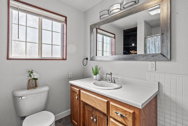 full bath with vanity and toilet