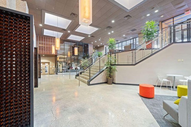 lobby with stairway and visible vents