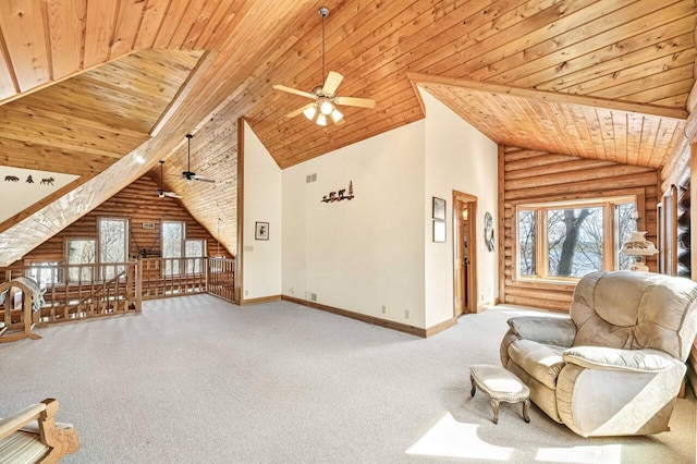 unfurnished living room with high vaulted ceiling, rustic walls, carpet floors, baseboards, and wood ceiling