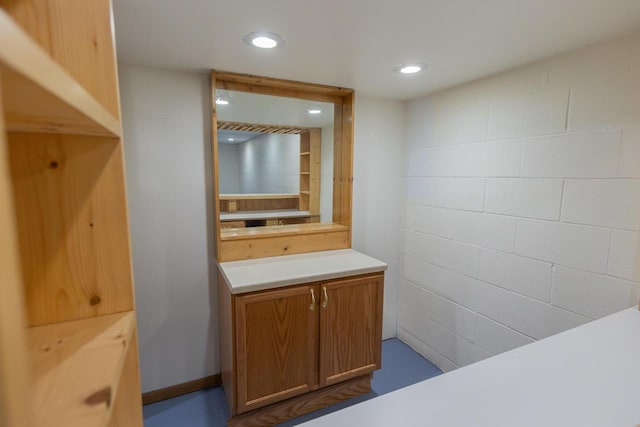 bathroom with vanity and recessed lighting