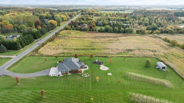 birds eye view of property featuring a rural view