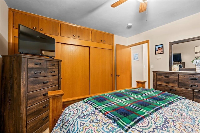 bedroom with a closet and ceiling fan