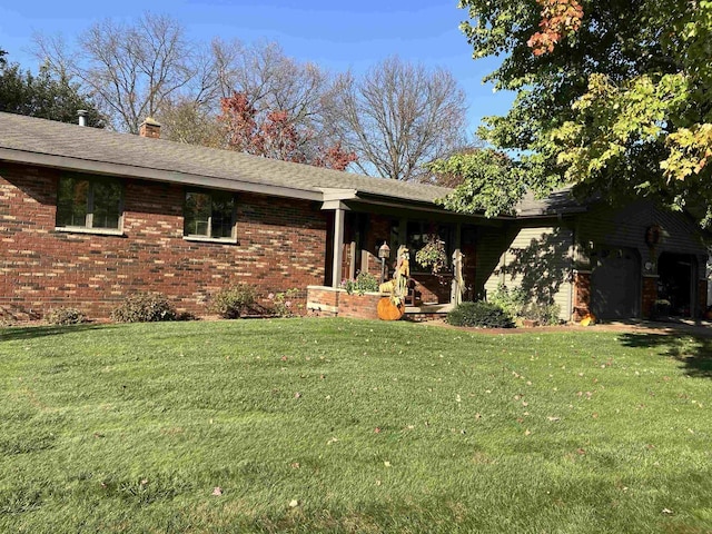 view of property exterior featuring a yard, brick siding, and a chimney