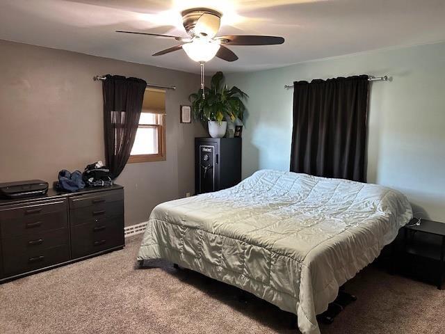 bedroom with carpet floors and ceiling fan