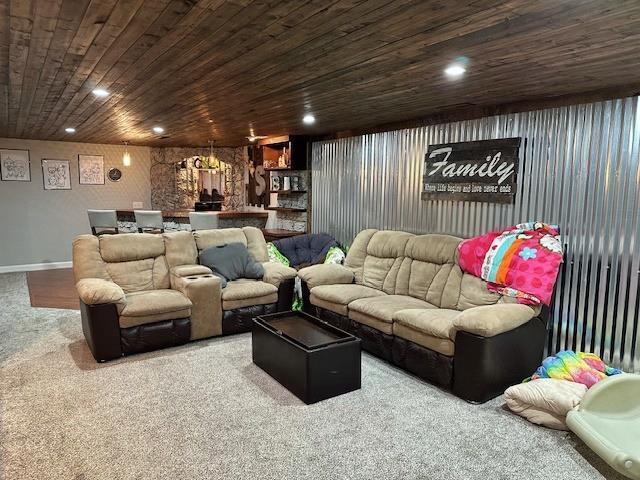 cinema room with recessed lighting and wood ceiling