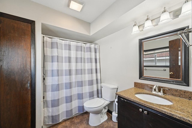 full bathroom with a shower with shower curtain, toilet, vanity, and tile patterned flooring