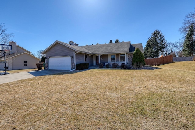 ranch-style house featuring a front yard, fence, driveway, covered porch, and a garage