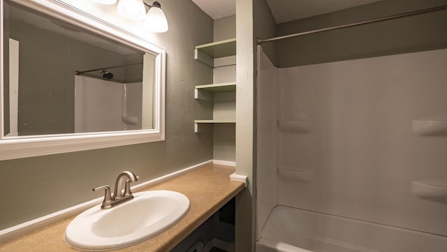 full bath featuring shower / washtub combination and vanity