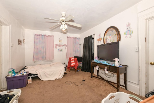 bedroom with carpet flooring and a ceiling fan