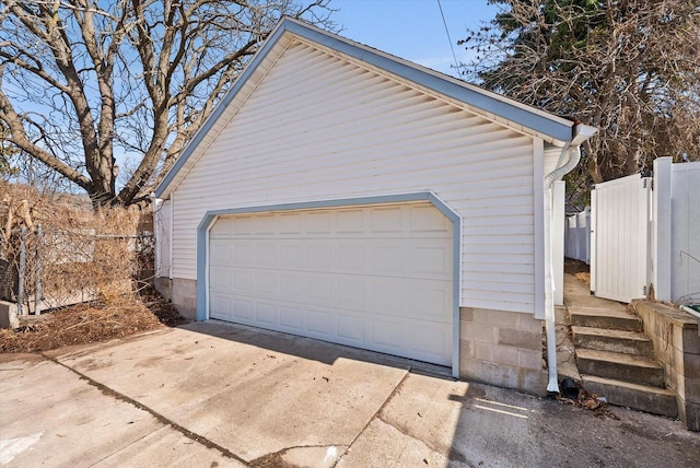 detached garage with fence