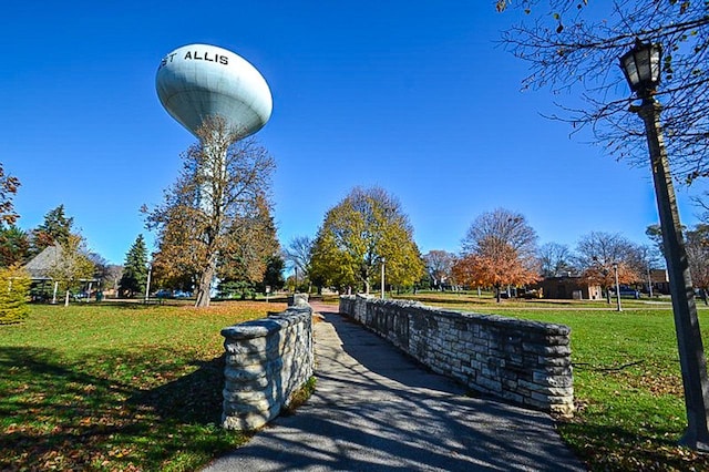 view of community featuring a lawn