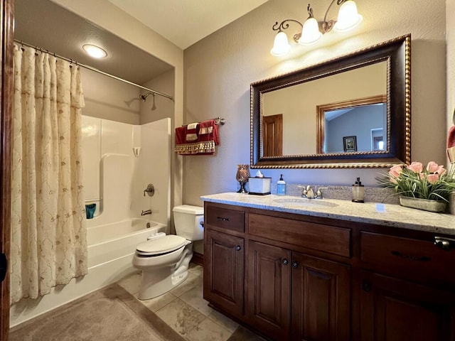 bathroom with tile patterned floors, toilet, vanity, and shower / bath combo