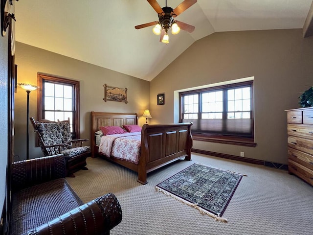 bedroom featuring baseboards, carpet floors, a ceiling fan, and vaulted ceiling