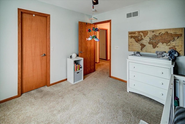 bedroom featuring carpet flooring, baseboards, and visible vents