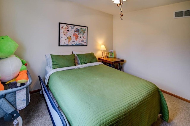 bedroom featuring carpet, visible vents, and baseboards