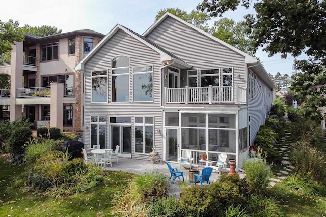 3018 Waubesa Ave, Madison, WI 53711 - back of house featuring a patio and a balcony