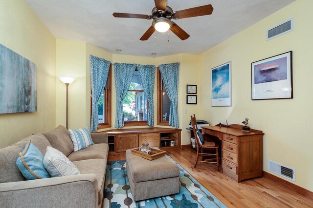 3018 Waubesa Ave, Madison, WI 53711 - living room with light wood-style floors, an office area, ceiling fan, and baseboards