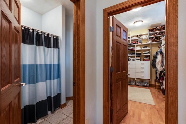3018 Waubesa Ave, Madison, WI 53711 - walk in closet with light wood-style floors