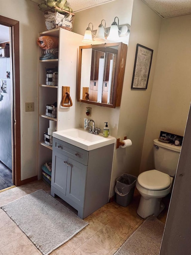 half bath with toilet and vanity