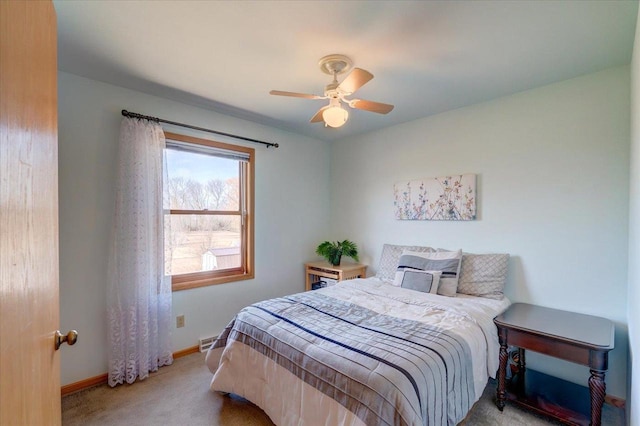 bedroom featuring baseboards, carpet, and a ceiling fan