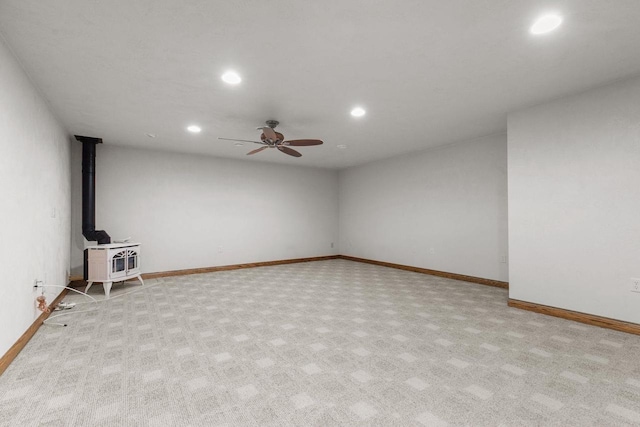 unfurnished living room featuring a ceiling fan, recessed lighting, carpet, and baseboards