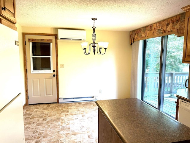 kitchen with an AC wall unit, dark countertops, a textured ceiling, white dishwasher, and a baseboard radiator