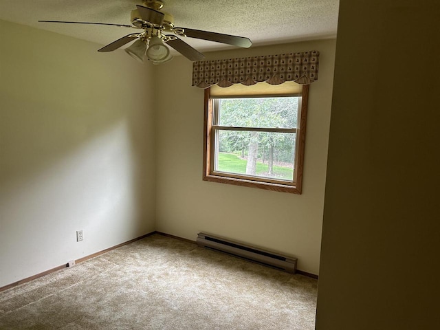 unfurnished room with a ceiling fan, a textured ceiling, carpet, a baseboard radiator, and baseboards