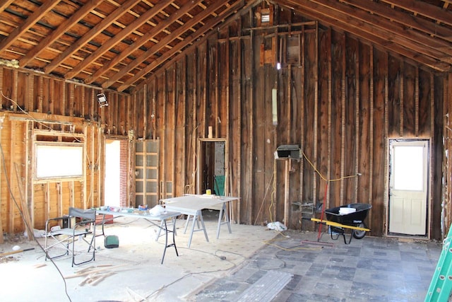 misc room with lofted ceiling