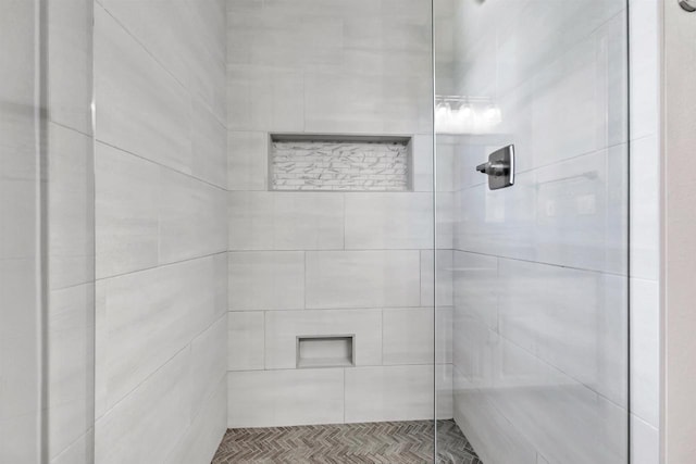 full bathroom featuring a shower stall