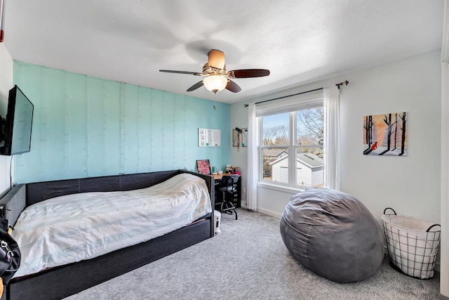 bedroom featuring baseboards, carpet, and a ceiling fan