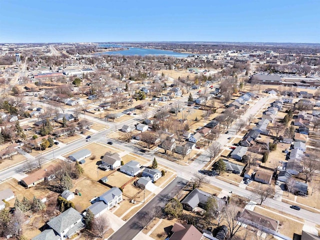 bird's eye view featuring a residential view and a water view