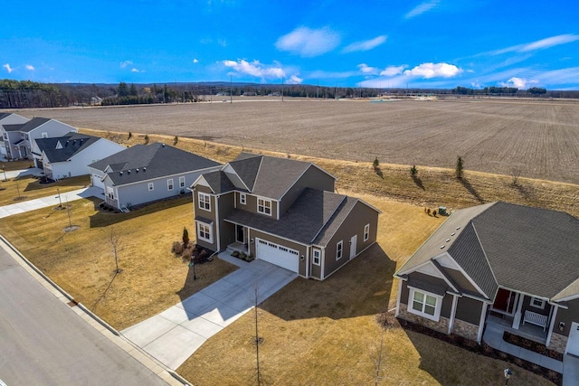 drone / aerial view with a rural view