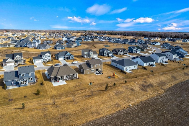 birds eye view of property with a residential view