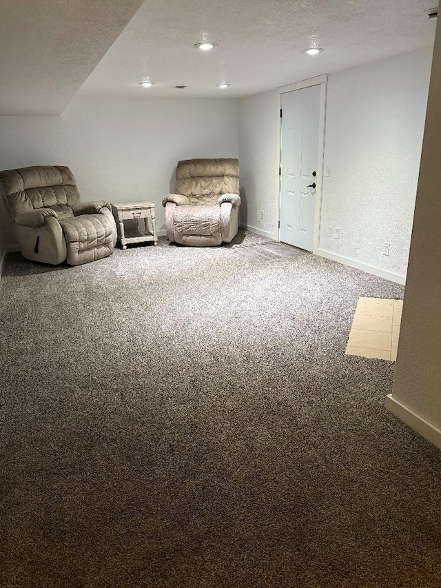 3743 S Milton Shopiere Rd, Janesville, WI 53546 - unfurnished room with baseboards, carpet floors, and a textured ceiling