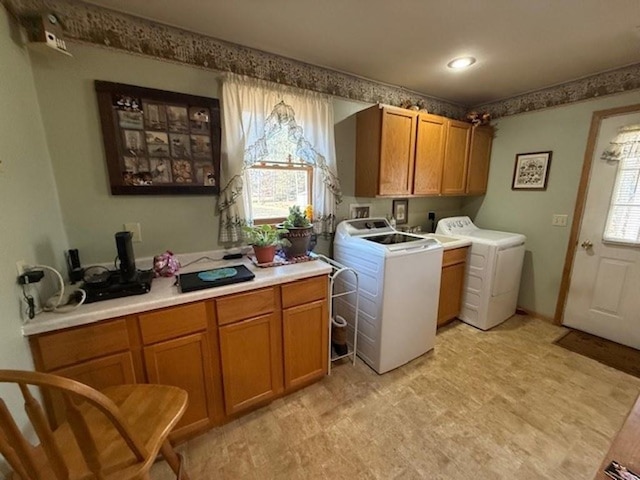 laundry area with washer hookup, laundry area, a healthy amount of sunlight, and electric dryer hookup