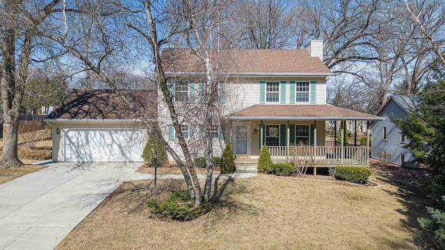 view of front of house with a front yard, covered porch, a chimney, driveway, and an attached garage